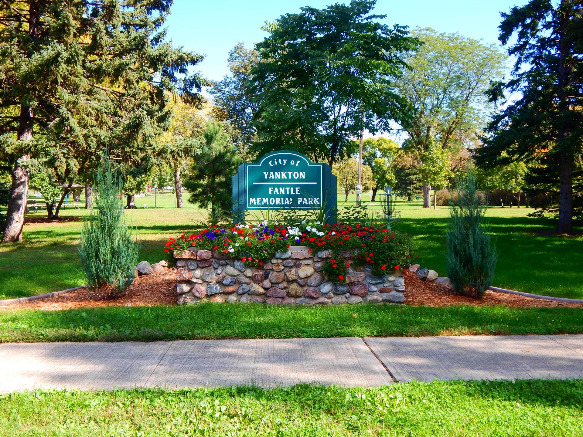 Fantle Memorial Park park sign with flowers